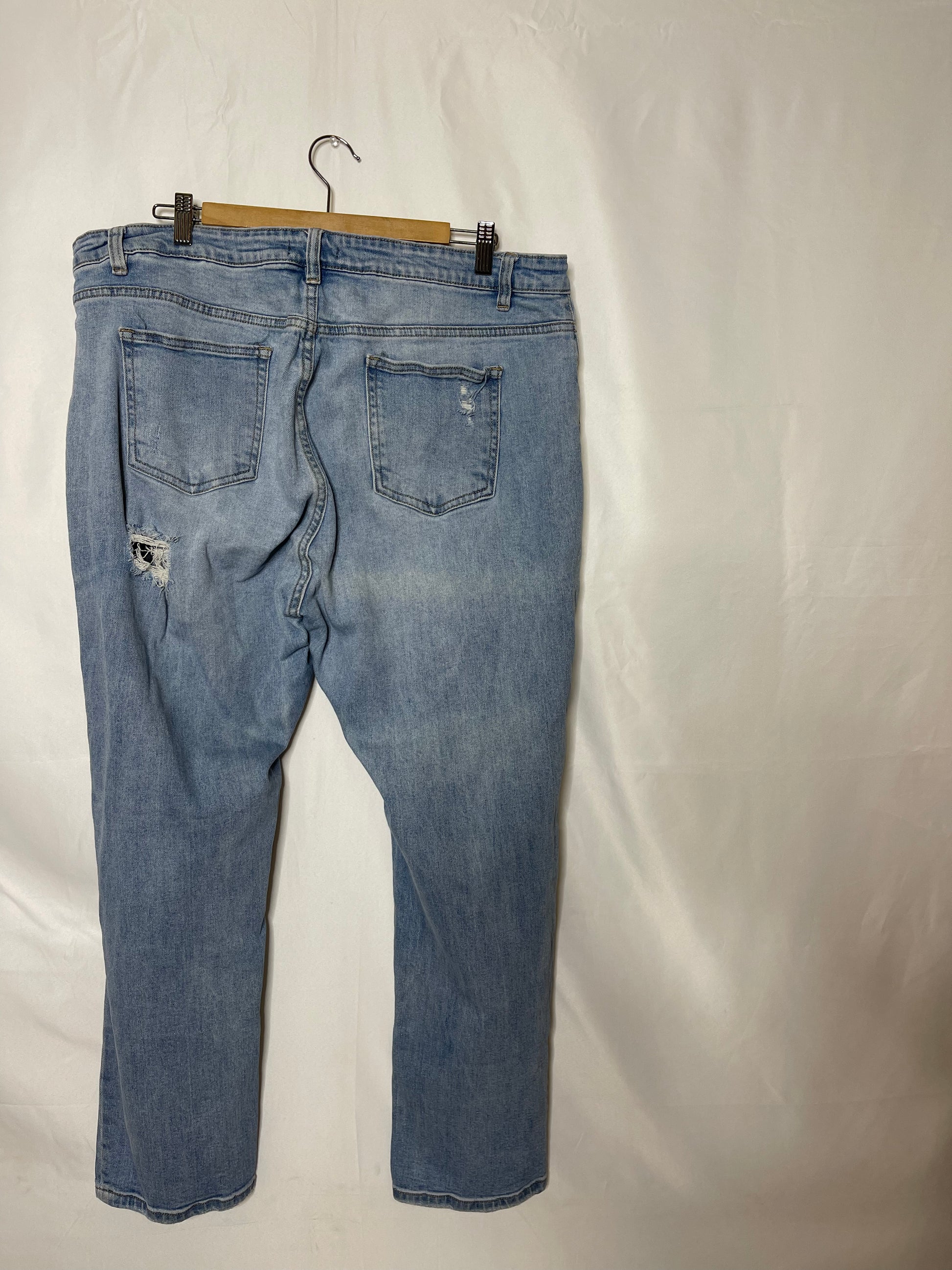 18 Fashion Nova distressed jeans" – Ashley Nell Tipton